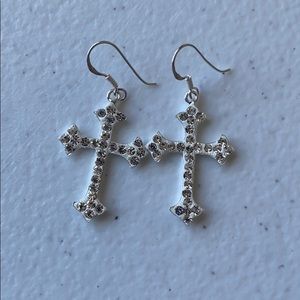 Brand new, never worn, sterling crosses